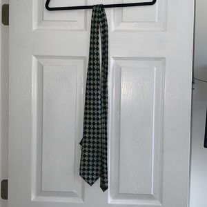Green and black checked tie